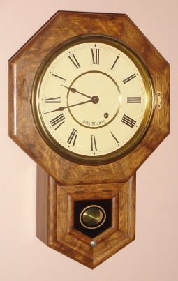 Seth Thomas Clock Co., 8-day, short drop octagon wall timepiece. Circa 1917 (dated on rear) — Antique Clocks Price Guide