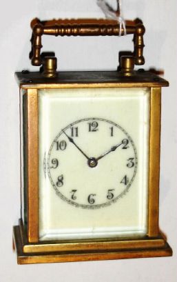 Waterbury Clock Co., MIDGE, miniature timepiece "carriage" timepiece, C.1910 — Antique Clocks Price Guide