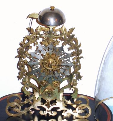 English, Skeleton timepiece, single fusee, cable drive with fretted and silvered dial, and with old glass dome, C.1890 — Antique Clocks Price Guide