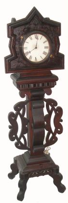 A. C.1890, New England Tramp Art pedestal / tall case, now with a 110v corded electric movement by E, Ingraham (C.1935) — Antique Clocks Price Guide