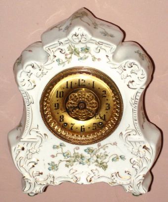 Waterbury Clock Co., 30-hour time/strike porcelain mantel clock. Circa 1900 — Antique Clocks Price Guide