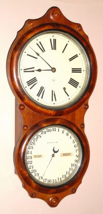 Seth Thomas Clock Co., "Office Calendar No. 4", 8-day time/strike double dial perpetual calendar wall clock. Circa 1880 — Antique Clocks Price Guide