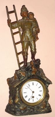 French, patinated spelter 8-day figural timepiece, the "Fireman", Circa 1912 — Antique Clocks Price Guide