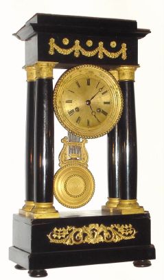 French, "F-C", 4-Column Empire style mantel clock, in an ebonized case with gilt bronze mounts, (swags and floral elements) gilt dial and pendulum, C.1860 — Antique Clocks Price Guide