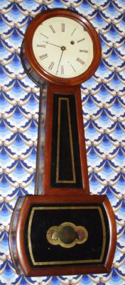 A Massachusetts Banjo timepiece, in a mahogany case, the movement perhaps a bit earlier, wheels with very long teeth, and designed for fillister screw attachment, now attached with a center rear screw, note period "barb" hands. C.1850 — Antique Clocks Price Guide