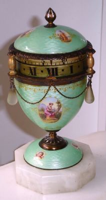 Swiss, for Austrian market, small annular dial "egg" style mantel clock, stem wind and set from side, with pastel green guilloche enamel over silver case, and with 7 little cameos, female motifs. — Antique Clocks Price Guide