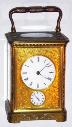 French, Brass cased carriage clock, time, strike and alarm on a bell, in a Corniche case with profuse floral engraving, c.1900 — Antique Clocks Price Guide