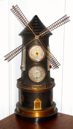 French, WINDMILL from the industrial series, clock and barometer in the central tower and the windmill driven by a spring motor in the base section of the mill, C.1885. — Antique Clocks Price Guide