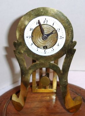 Austrian, 30-hour miniature timepiece and dial from a different case now fitted to brass frame and mounted onto a modern walnut base, C1830 — Antique Clocks Price Guide