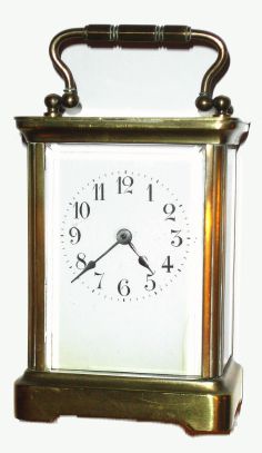 French, smaller brass cased carriage timepiece, with cylinder 'scape, in a plain Corniche case, porcelain dial with Arabic numerals. C.1900 — Antique Clocks Price Guide