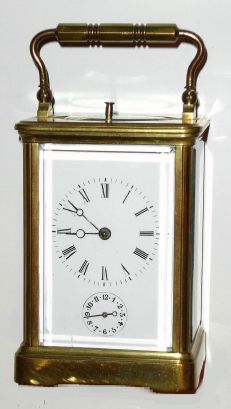 French, Brass cased carriage clock, time, strike, alarm and repeat, in a plain Corniche case, with original travel case which has losses, C.1900. — Antique Clocks Price Guide