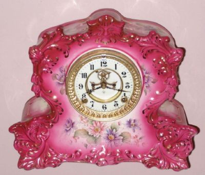 Ansonia Clock Co., REVIEW, in dark pink, porcelain china clock with open escapement dial, C.1900/ — Antique Clocks Price Guide