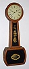 Unsigned Massachusetts banjo clock, weight driven, 8-day, in a bleached mahogany case, C.1840.