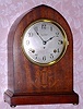 Seth Thomas, Chime Clock No. 64, 5-bell Sonora, with alternate "lyre" inlay below dial, mahogany case. C. 1914.