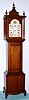 Mahogany grandmother clock, with a signed, period Howard and Davis, Boston, regulator movement, with 70 beat pendulum, and painted arched dial. C. 1970.