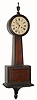 German, Mahogany cased banjo clock, 8-day time and strike with 8-day going barrel movement with rack striking on a gong. C.1920.
