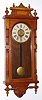Ansonia Clock Co., QUEEN ELIZABETH, wall timepiece in oak, 8-day. C.1901.