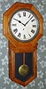 E. Ingraham and Co., "COMMERCIAL" long drop octagon school clock, time only. C.1911.