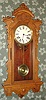 E. Ingraham and Co., "PACIFIC", fancy oak wall clock, 8-day, time and gong strike. C.1896.