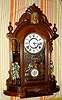 F. Kroeber, New York, "OCCIDENTAL" model, 8-day brass time and strike movement in walnut mirror-sided case flanked by two gilded cupids shelf clock, spring driven. C, 1881.