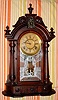 Connecticut shelf clock, 8-day brass time and strike movement in black walnut case with full round fluted columns, spring driven. C. 1880.