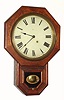 Seth Thomas Clock Co., DROP OCTAGON 12 INCH, short drop octagon timepiece in oak, 8-day. C.1910.