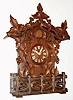 A. Frankfeld and Co., Philadelphia, shelf cuckoo, 8-day, spring driven, Waterbury movement, case with restoration to carvings. C.1870.