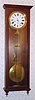 New York, Wall hanging Jeweler's regulator, walnut case, with lyre pendulum engraved: "EST'D 1860, M. L. SHEEHAN, 785 8TH AVE, N.Y". This clock hung at the base of Mr. Goddard's stairs since 1970, and the foto was taken in place at his home in June 2009. C.1890.