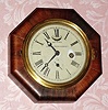 Jerome and Co (?)., small 30 hour lever movement in a rosewood veneered octagon case. C.1870.