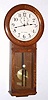Seth Thomas, Thomaston, Conn. (Div Gen'l Time Instruments Corp) "REGULATOR NO. 2" model, 8 day time only No. 77 B brass mvt in oak case with 12" dial, weight driven. C. 1930.