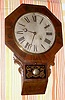 E. N. Welch, Forestville, Conn, "DROP OCTAGON NO. 2" model, 8 day time brass mvt in rosewood veneer case with 12" dial, spring driven. C. 1880.