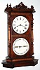 Seth Thomas Clock Co., Thomaston, PARLOR CALENDAR No. 8, in walnut with maple trimmings, double dial perpetual calendar, time and gong strike, spring. C.1885 (dated Aug 1885 on rear).