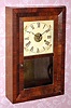 Seth Thomas "KITCHEN" model miniature bevel front in rosewood, 30-hour time and gong strike, spring. C.1870.