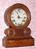 E. Ingraham and Co., "GRECIAN" round top shelf clock, 8-day time and gong strike, spring. C.1870.