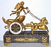 French, Fabrique D'Horologerie, Paris, Amor standing in his charriot, at the reins of a pair of charging horses, a fine French figural clock in a design that was popular for over 2 centuries. 8-day time and bell strike, No. 2508. C.1880.