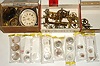 Box lot, best part of which is a carefully inventoried lot of 6-dozen new bulls eye watch crystals, glass, in various sizes, other items include a clock movement in pieces, minus its springs, and another large cigar box of dial plates and small novelty clock bezels.
