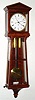 Viennese 30 Day calendar movement by Johann Worle, Wien, now in a later purpose made Laterndluhr case of uncommon 9-light keystone design, rich mahogany veneer with holly banding or edging. movement driven by two weights supported by a single wheel pulley with saddle, with maintaining power and early tapered pillars. And with old crank. C.1830.