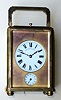 French, TEC and Charles Hour for J. E. Caldwell, Philadelphia, GRAND SONNERIE brass cased carriage clock in an uncommon one piece case w/ full glass top, probably to special order by Caldwell, and with bottom selector for Hours and Quarters, Quarters, and Silent, and with alarm and repeat, and original travel case with Caldwell's imprint inside the cover, serial 18057. C.1890.