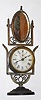 Ansonia Clock Co., 30-hour novelty mirror clock rear wind movement. Circa 1885.