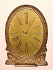 Waltham Watch Co, Bronze cased desk clock, with gilt dial and robust 8-day car clock mov/t, stem wind from bottom. C.1935