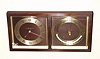 Chelsea Bronze, strut desk set in rectangular bronze frame, clock to left and barometer to right, with thermometer in center, serial No. 196514, retailed by Abercrombie and Fitch, New York, C.1930