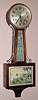 E. Ingraham and Co.," Treasure or Treasure Island", 8-day time/strike banjo clock. Circa 1934