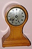 English, uncommon balloon style mantel clock, with single chain fusee movement, 8-day, C.1890.