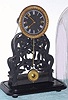 Atkins and Whiting, iron framed, Wagon Spring (Ives patent) skeleton timepiece under glass dome, C.1855