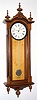 E. Howard and Co., Boston, "REGULATOR No. 59", in a light walnut case with maple baffle cover, 8-day, weight, eight inch dial, c.1976