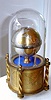 Swiss, miniature Globe Timepiece, with jeweled lever movement, and attached winder under base, with original glass dome, C. 1950