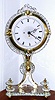 German, a small, cut crystal mantel or desk clock, with a small pendulette movement, and a frosted glass dial, C.1900