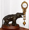 German, Junghans, ELEPHANT swinger or mysterious swinging timepiece, the clock arm moving from side to side without apparent impulse, C.1910
