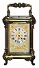 C.1900, French, for J. E. Caldwell, Philad'a, a carriage clock, time, gong strike and repeat, in a column case with Louis XVI style feet and embellishments.
