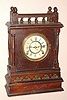 Kroeber Clock Co., New York, a walnut cabinet clock with ballustrade on top, 8-day, spring. C.1875